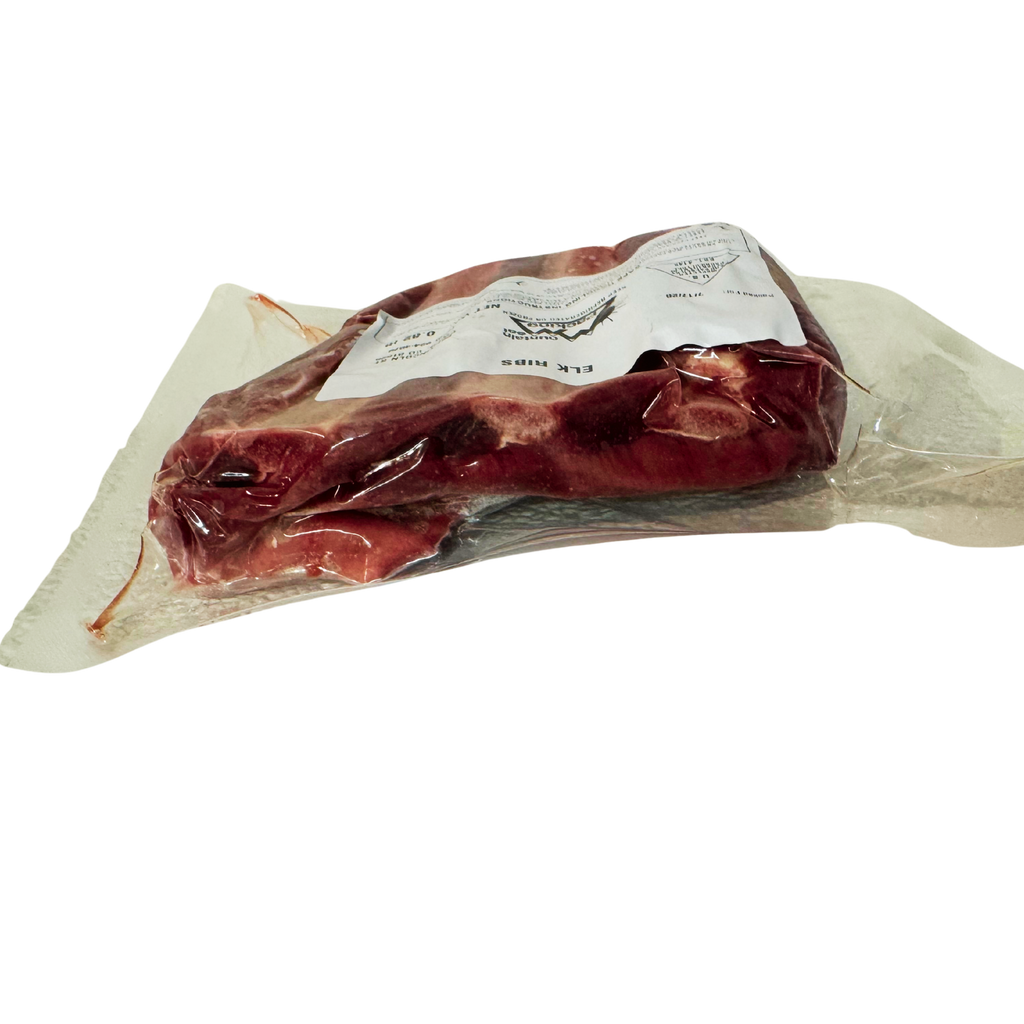 Side view of elk ribs showing meat and rib bones.