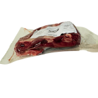 Side view of elk ribs showing meat and rib bones.
