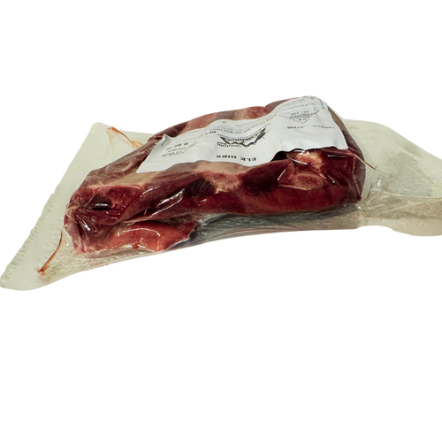 Side view of elk ribs showing meat and rib bones.